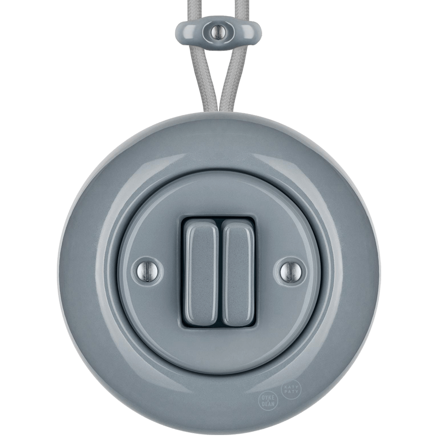 PORCELAIN KATY PATY COLONA ROUND SURFACE MOUNTED DOUBLE SLIM BUTTON SWITCH ASH GREY - DYKE & DEAN